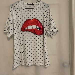 Fun polka dot shirt with sequin red lip.